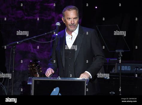 Kevin Costner speaks on stage at the Pre-Grammy Gala on Saturday, Feb ...