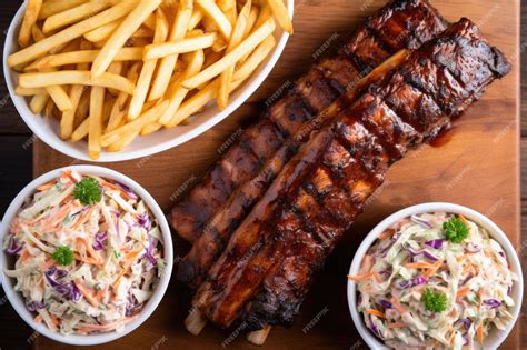 Premium AI Image | Overhead shot of bbq ribs coleslaw and fries divided in sections