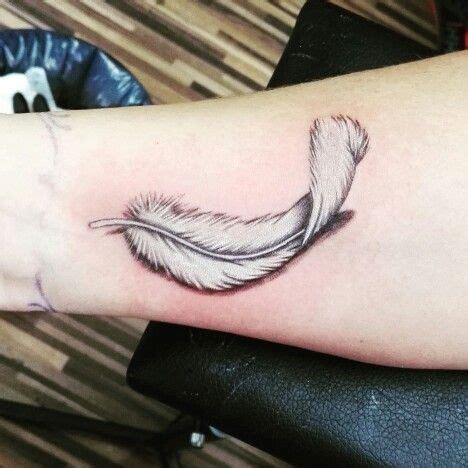 Extreme Art Tattoo & Piercing | White feather tattoos, Feather tattoos, Feather tattoo design