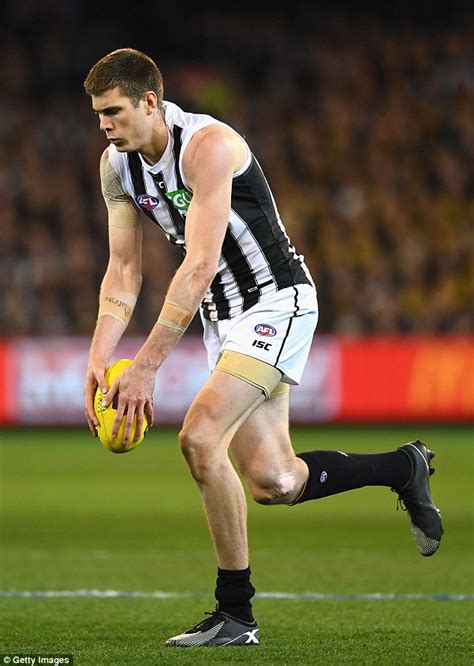 7-foot tall American footy star steals the show with performance as Collingwood thrash Richmond ...