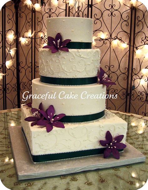 Ivory Wedding Cake with Purple Stargazers and Clover Green… | Flickr