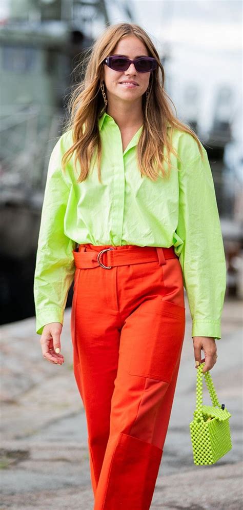 11 fashion stylists on the one trend they’re buying this season | Neon outfits, Green shirt ...
