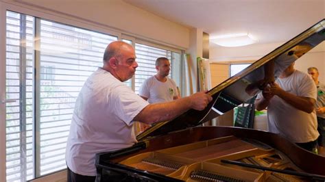 How to safely move a piano | KAE International Movers