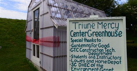 Greenville Tech Charter High School students build community greenhouse