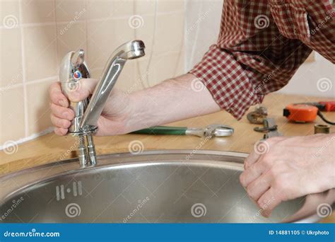 Kitchen Tap Installation Royalty Free Stock Photo - Image: 14881105