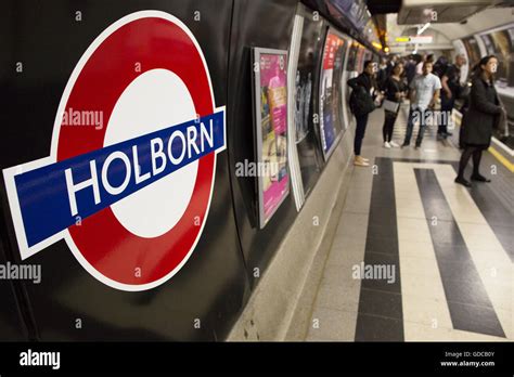 People traveling on the London Underground, Holborn Tube Station ...