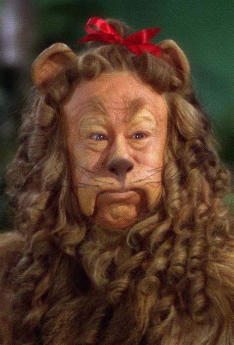 Cowardly Lion in Emerald City | Wizard of oz characters, Wizard of oz ...