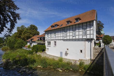 Germany, North Rhine-Westphalia, Lemgo, Bega river and exterior of Langenbrucker Mill stock photo