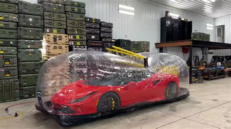 Watch A YouTuber Throw Ladders And Stuff At A Ferrari Parked In A Plastic Storage Bubble - The ...