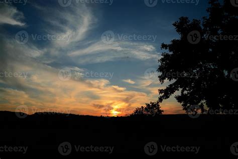 Orange sunset with beautiful clouds 4192331 Stock Photo at Vecteezy