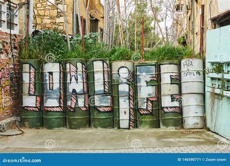 Barrels with Graffiti of the Green Line in Nicosia Editorial Photo - Image of border, landmark ...