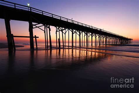 North Carolina Beach Pier - Sunrise Photograph by Wayne Moran