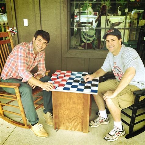 A very casual shot of James playing checkers with the real Brad Cohen ...