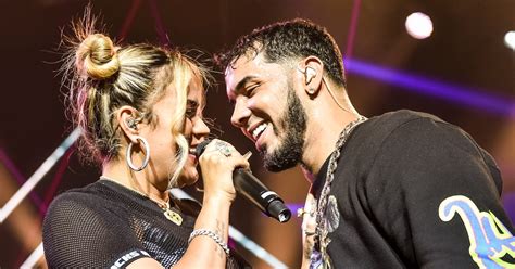 Anuel AA & Karol G's Relationship Timeline Reveals How Quickly These Two Fell In Love