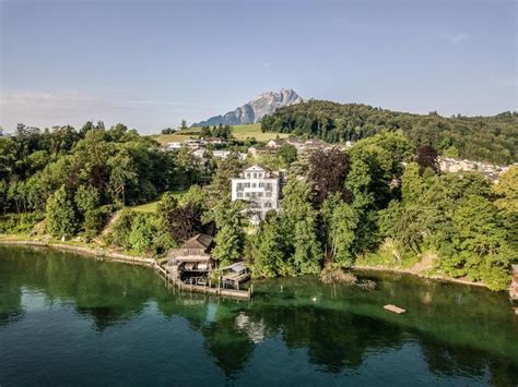 Historic Switzerland Villa by the Lake | A staircase connects the villa ...