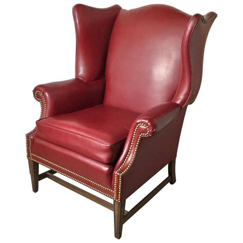 Pair of Leather Wing Chairs with Nailhead Trim at 1stDibs