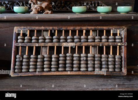 Old Chinese abacus Stock Photo - Alamy