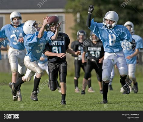 Youth Football Pass Image & Photo (Free Trial) | Bigstock