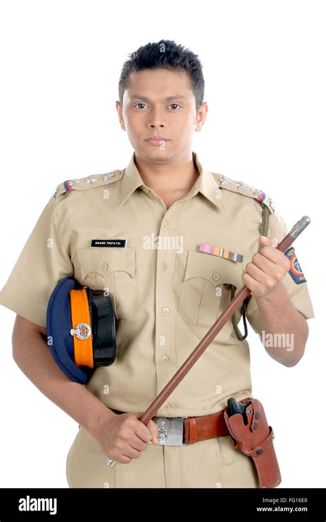 Police inspector in uniform with cap and stick in hand MR#782W Stock Photo - Alamy