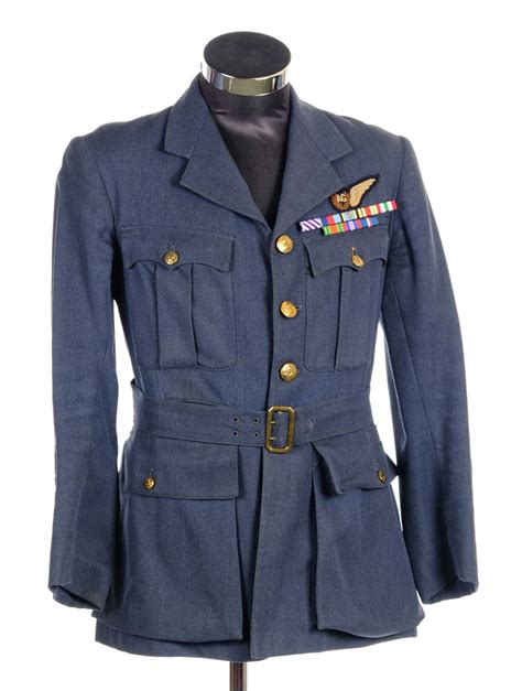 Sold at Auction: * RAF Uniform. A WWII RAF uniform worn by an Air Gunner, with cloth badge and ...