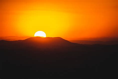 Silhouette of Mountain during Sunset · Free Stock Photo