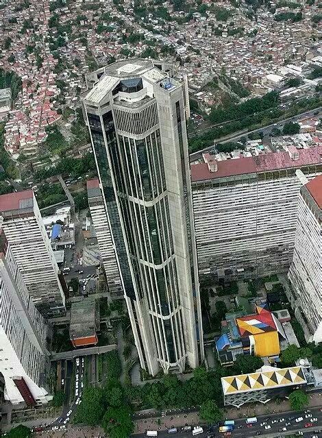 an aerial view of a city with tall buildings