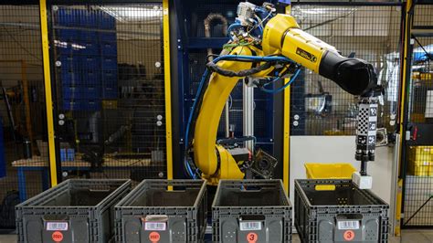 Amazon's latest robot picker for warehouses uses AI to identify objects ...