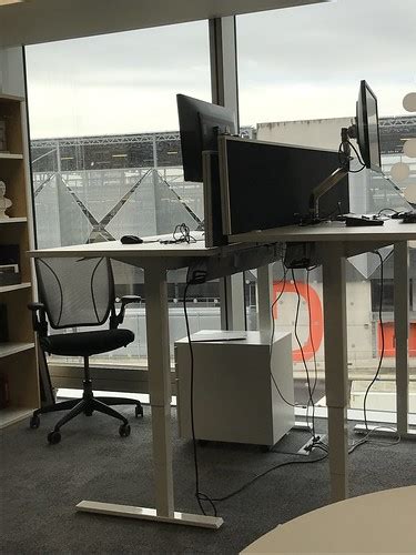 Height adjustable standing desk in office | Dom Pates | Flickr