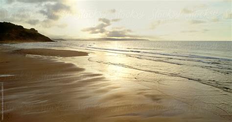 "Aerial View Of A Wild Beach At Sunset" by Stocksy Contributor "Marco ...