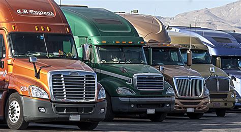 Semi Truck Fleet Photograph by Gunter Nezhoda