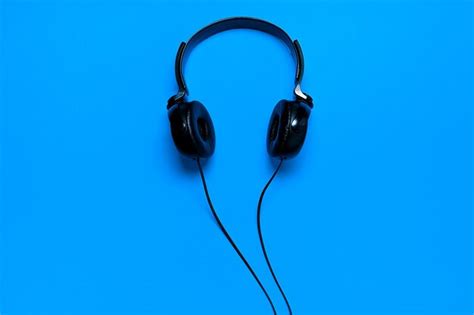 Headphones on blue | Premium Photo