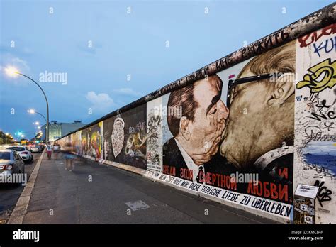 Berlin Wall mural, East Side Gallery, The kiss, Berlin, Germany Stock Photo - Alamy