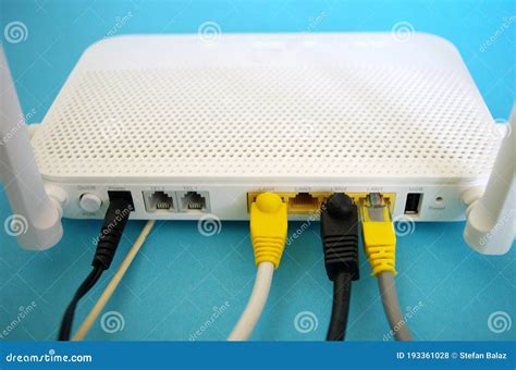 Fiber Optic Internet. Network Cables Connected To a Router. Wireless ...