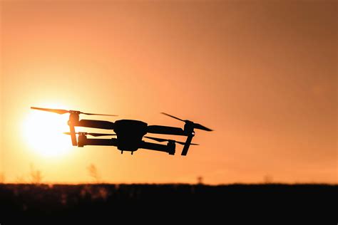 Silhouette of Camera Drone Flew in Mid Air · Free Stock Photo