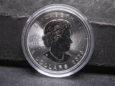 At Auction: 2023 Silver Elizabeth II 5 Dollar Coin