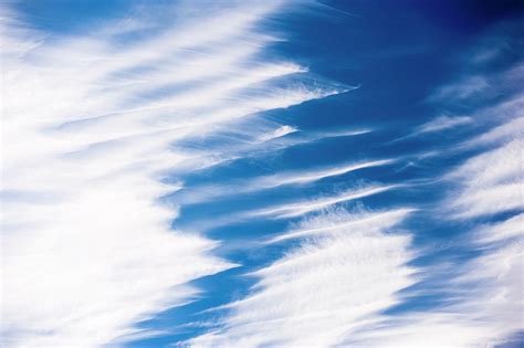 Cirrus Clouds Displaying Wind Shear, Brechin, Scotland, Uk Photograph ...