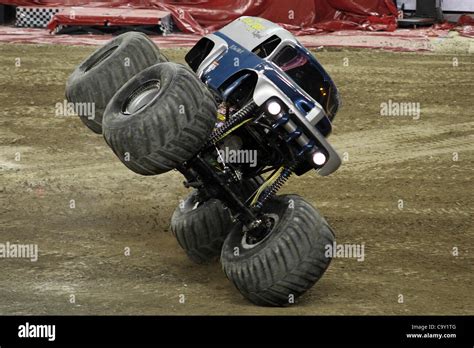 March 3, 2012 - Detroit, Michigan, U.S - Grave Digger the Legend lands on two wheels after a ...