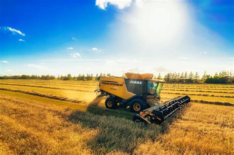 A Combine Harvester on the Rice Field · Free Stock Photo