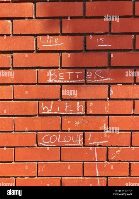 Life is better with colour graffiti on a brick wall Stock Photo - Alamy