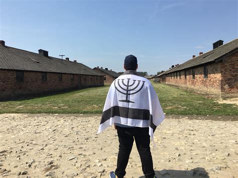 Me and my Yiddish flag in Auschwitz. (Please read my comment for more ...