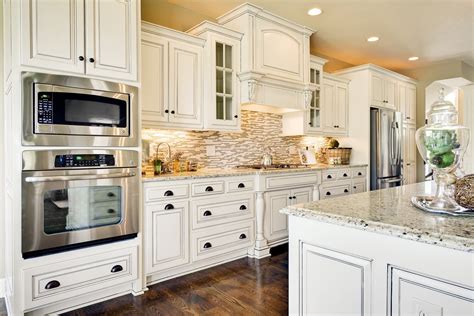 Antique White Kitchen Cabinets With Dark Granite Countertops | Two ...