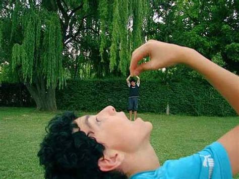 The Man Eating Giant Optical Illusion