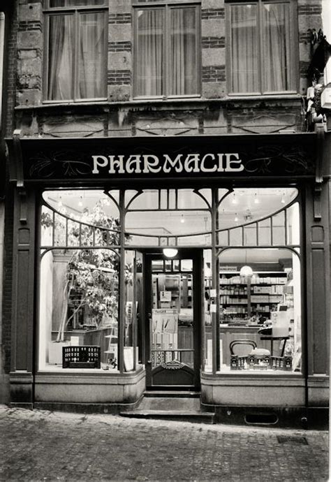 Exterior of a Building with a Pharmacy · Free Stock Photo