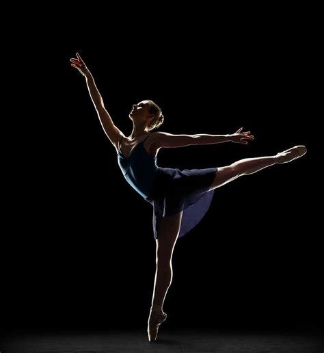 Ballerina In Arabesque Position Photograph by Lewis Mulatero - Fine Art America