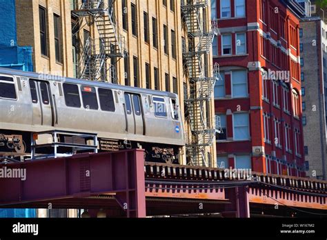 Chicago, Illinois, USA. A CTA Orange Line rapid transit train entering ...