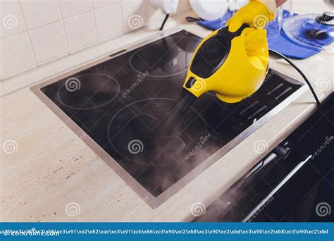 Cleaning Kitchen Hob with a Steam Cleaner. Stock Image - Image of work ...