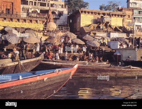 the bathing ghats at varanasi at sunrise Stock Photo - Alamy