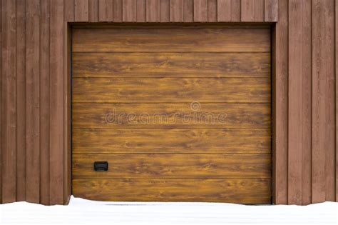 Roll-up wooden garage door stock image. Image of residential - 274289943