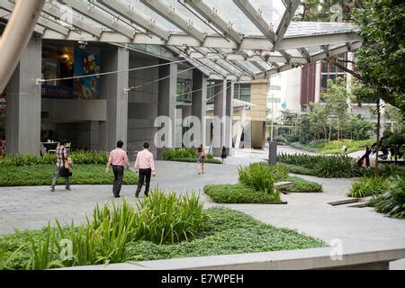 People walk through the Biopolis in Singapore Stock Photo - Alamy