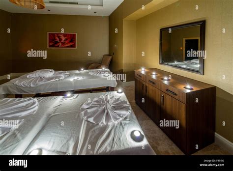 Spa room with burning candles Stock Photo - Alamy